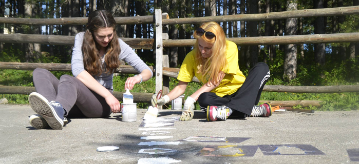 Volunteers Working on painting 