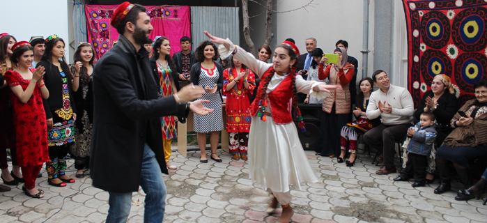 Young Adults Participating in Traditional Tajik Dance for Navruz Celebration