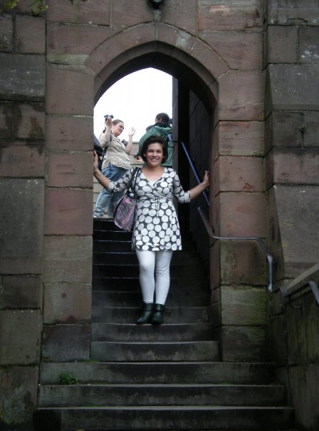 Megan posing in a stairwell in Liverpool on her first study abroad