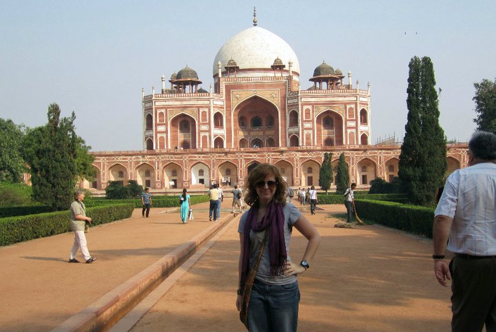 Anna posing in front of a temple in India in 2009.