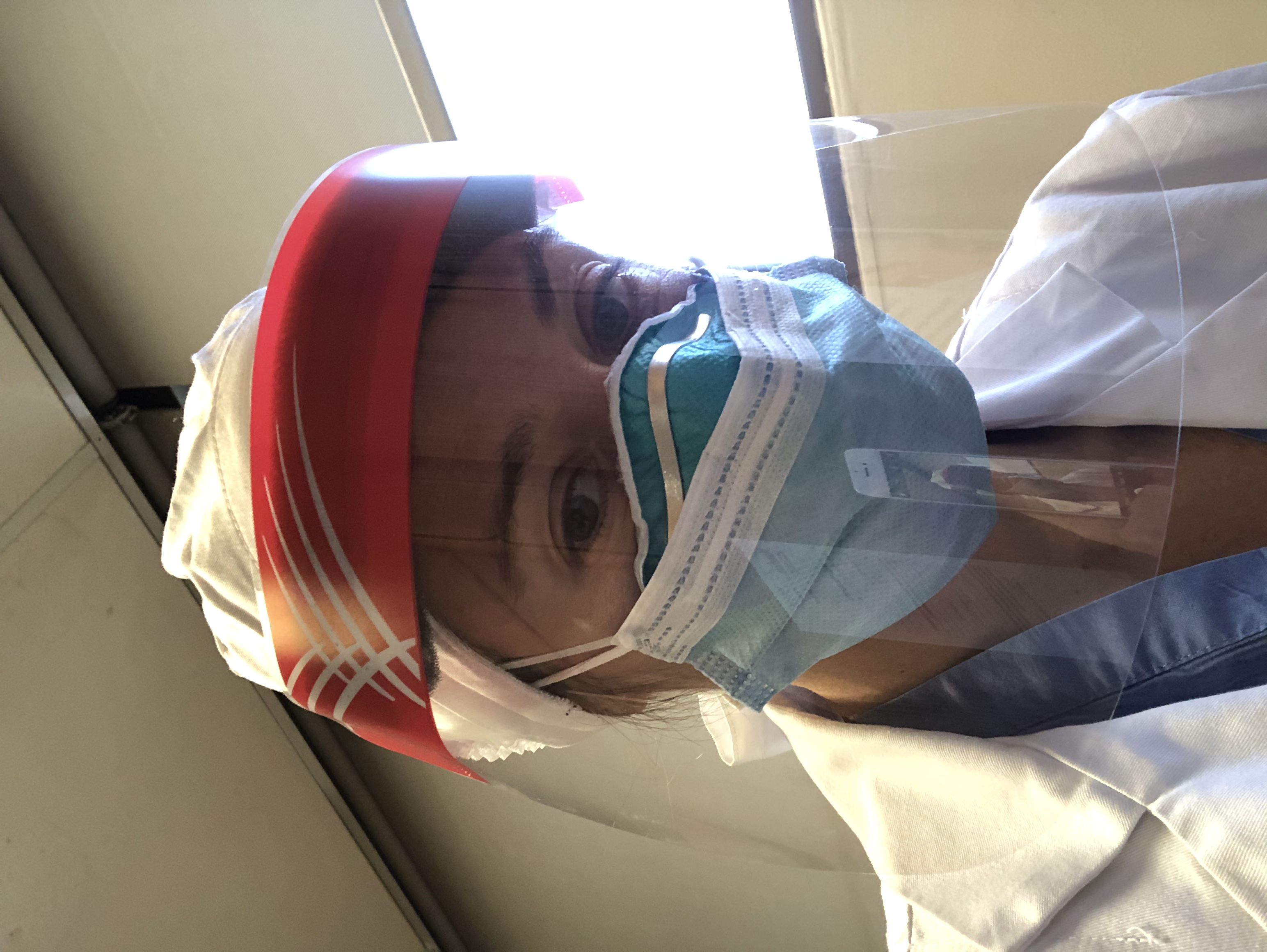 Dr. Goloborodka, dressed in personal protective equipment at the ER
