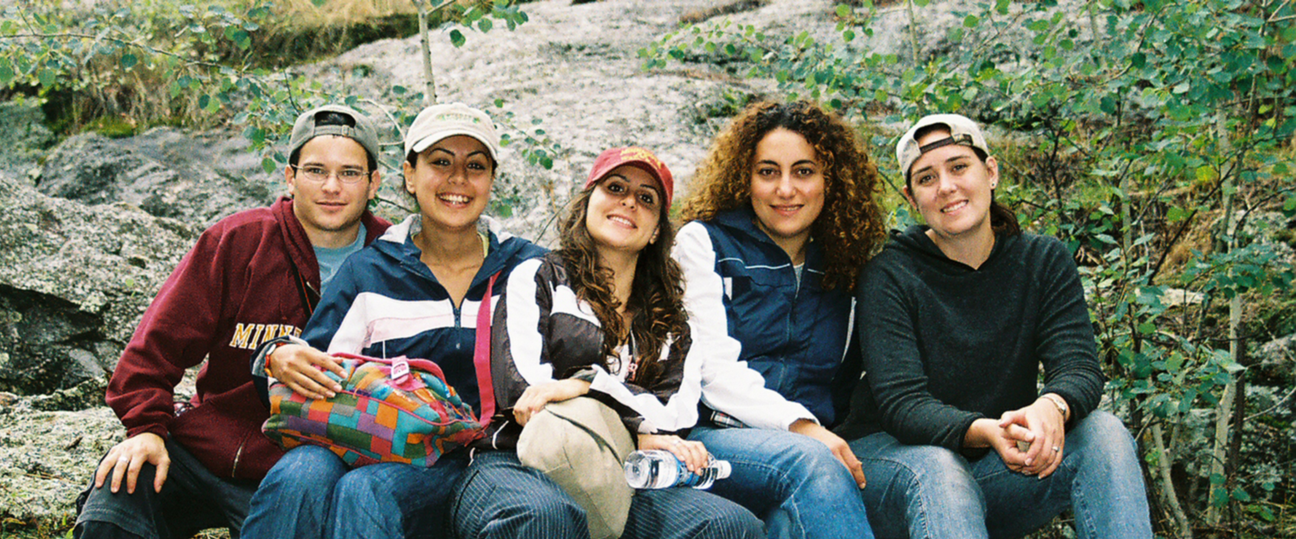 Karissa and host students, seated outdoors