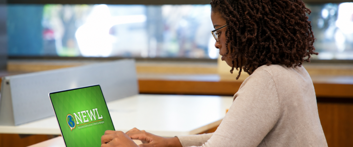 student taking exam on laptop