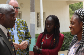 US Ambassador to Senegal, Dr. Tulinabo Mushingi, speaks with students.