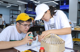 AUCA Makerspace, students collaborating on project