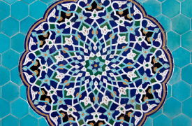 A teal green mosaic with a blue pattern