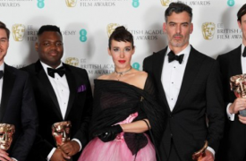 BAFTA award winners pose on the red carpet