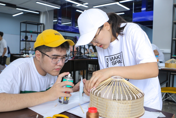 AUCA Makerspace, students collaborating on project