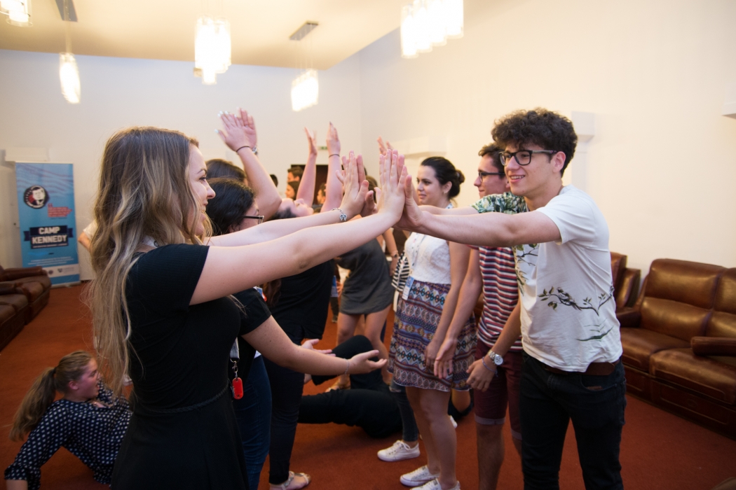 Romanian teenagers line up for high fives