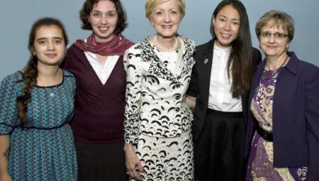 Secretary Ann Stock joins Lisa Choate and FLEX students for a photo
