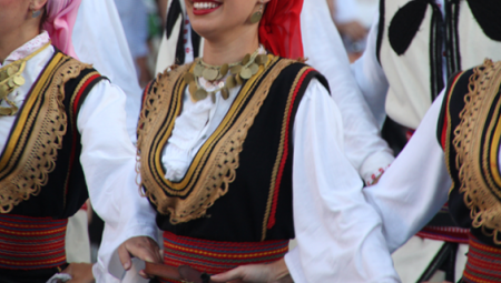 Three Serbian women in traditional dresses