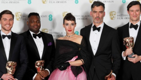 BAFTA award winners pose on the red carpet